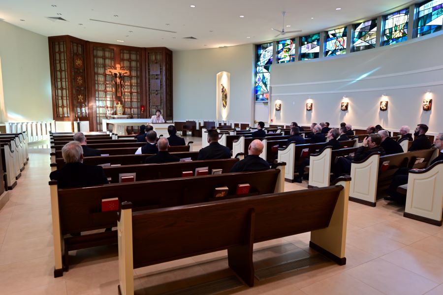 Men in Reflection in Chapel