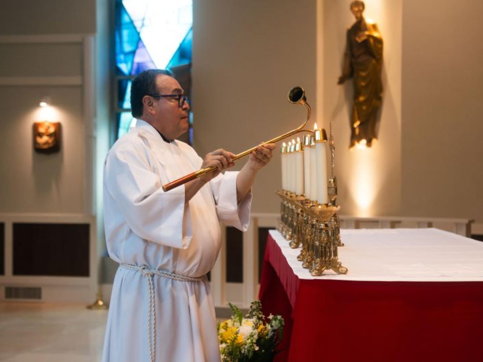 Nic Lighting the Candles